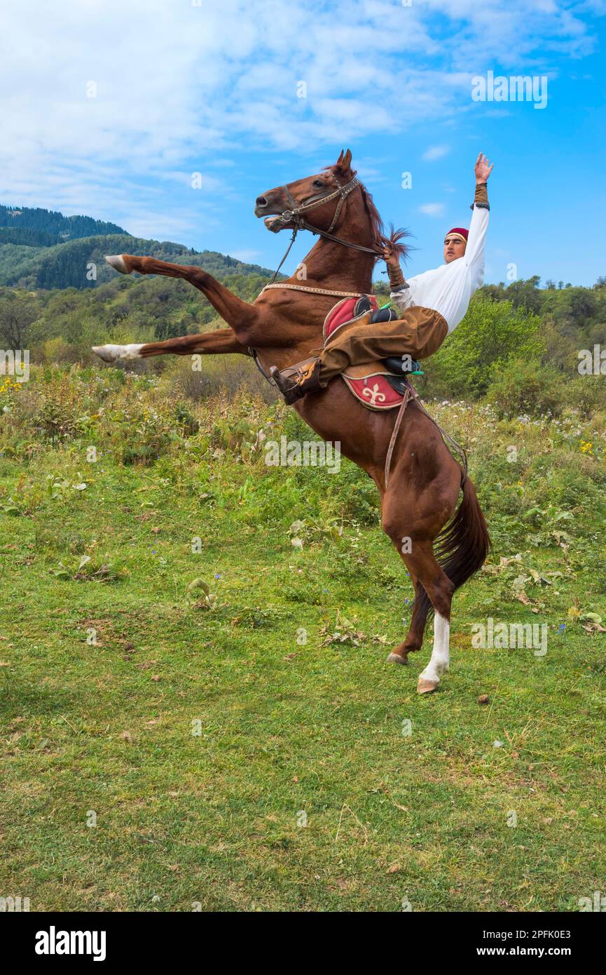 Man on a rearing horse, Kazakh ethnographic village Aul Gunny, Talgar ...