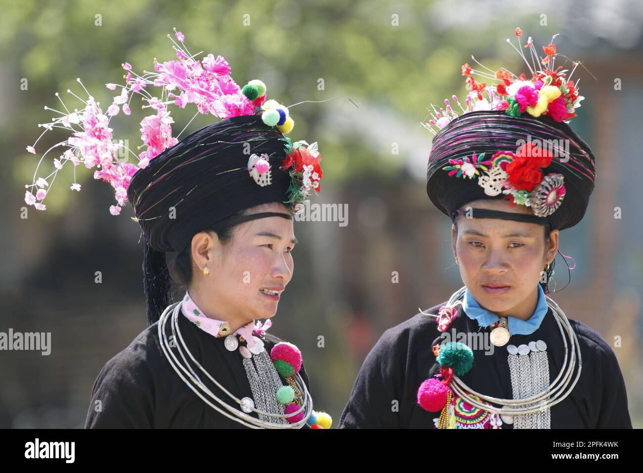 Achang ethnic minority tribe, two woman, close-up of heads, Husa, Western Yunnan, China, marching Stock Photo