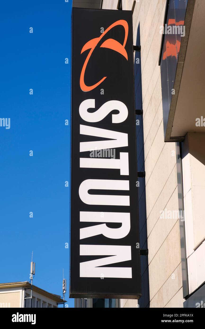 Facade with sign and logo, SATURN, consumer electronics store, Hagen, North Rhine-Westphalia, Germany Stock Photo