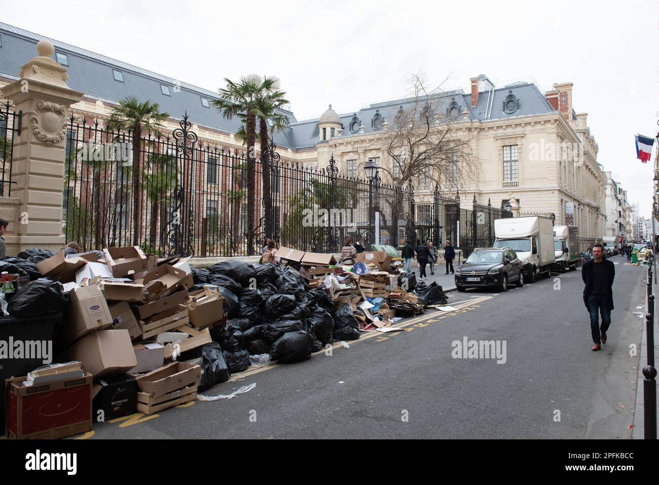 PARIS, FRANCE MARCH 17 Rubbish and overflowing bins line a street