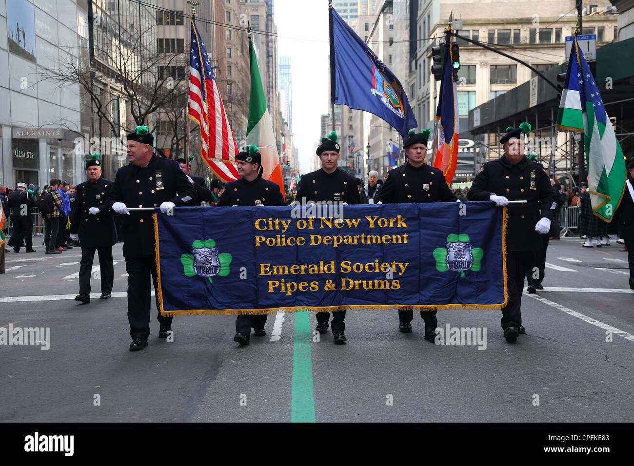 The Police Department Emerald Society Pipes & Drums performs during the