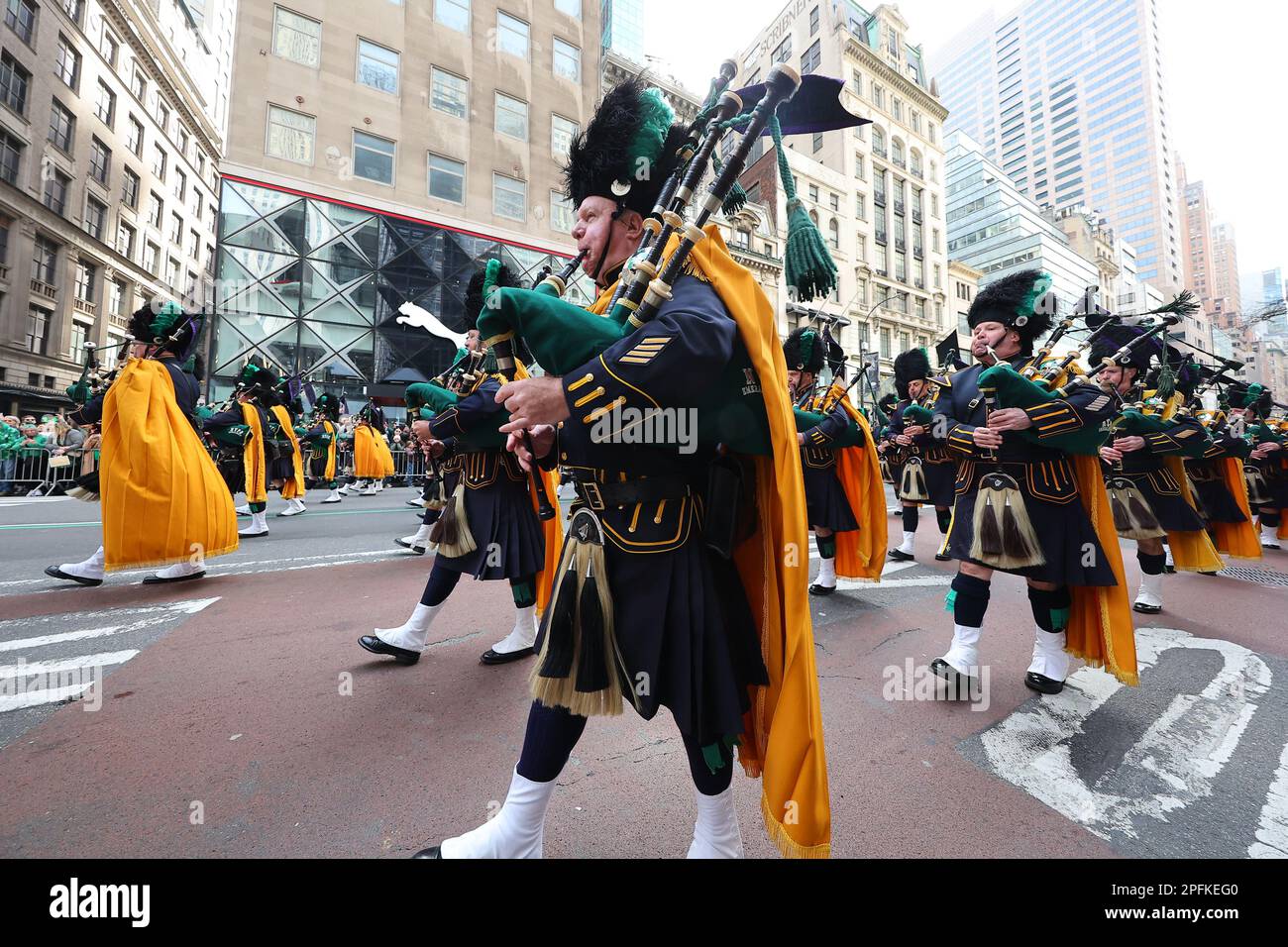 The Police Department Emerald Society Pipes & Drums performs during the
