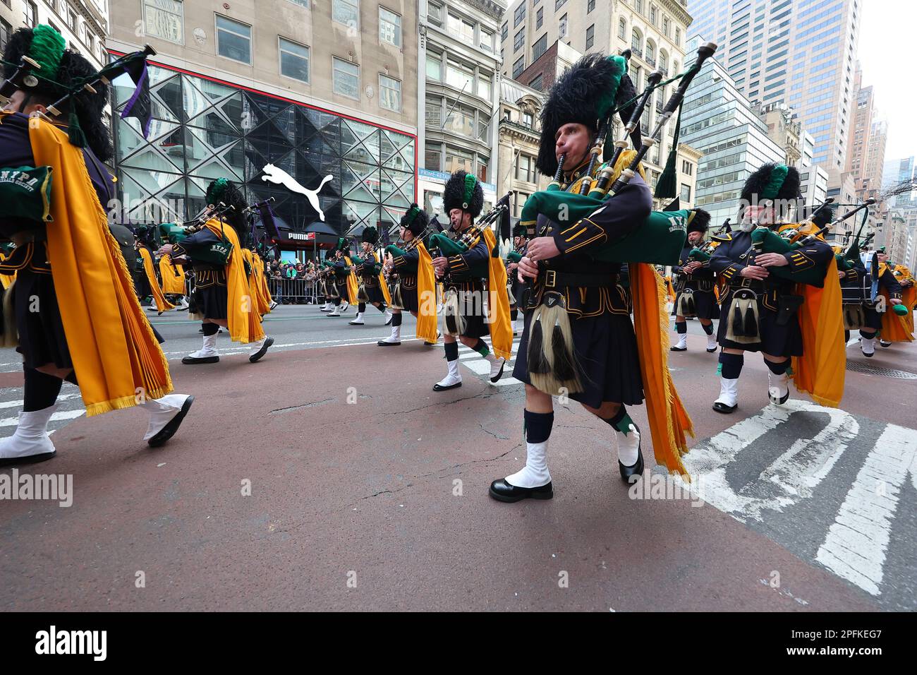 The Police Department Emerald Society Pipes & Drums performs during the
