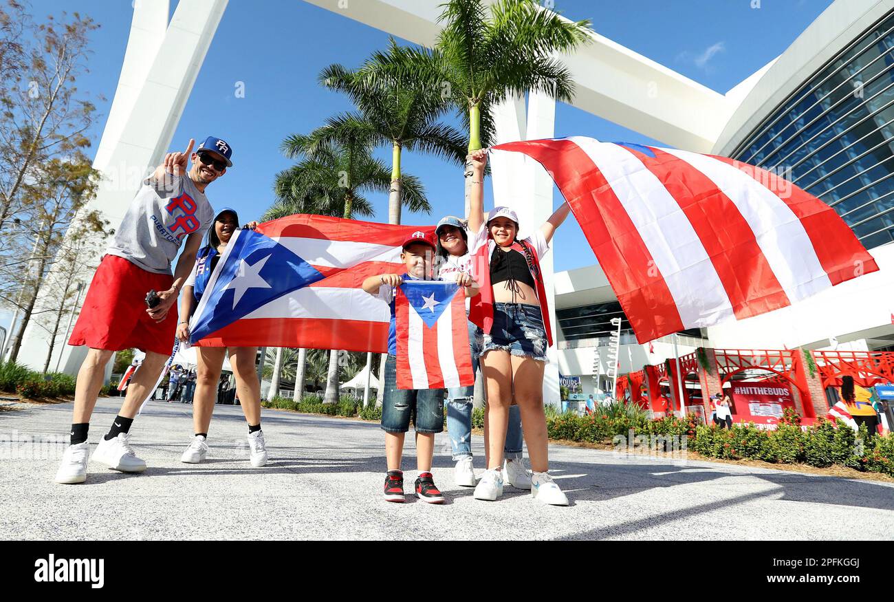 Miami, United States. 17th Mar, 2023. Baseball fans pose for a photo outside of LoanDepot Park prior to the start of the 2023 World Baseball Classic quarterfinal game between Mexico and Puerto Rico in Miami, Florida on Friday, March 17, 2023. Photo by Aaron Josefczyk/UPI Credit: UPI/Alamy Live News Stock Photo