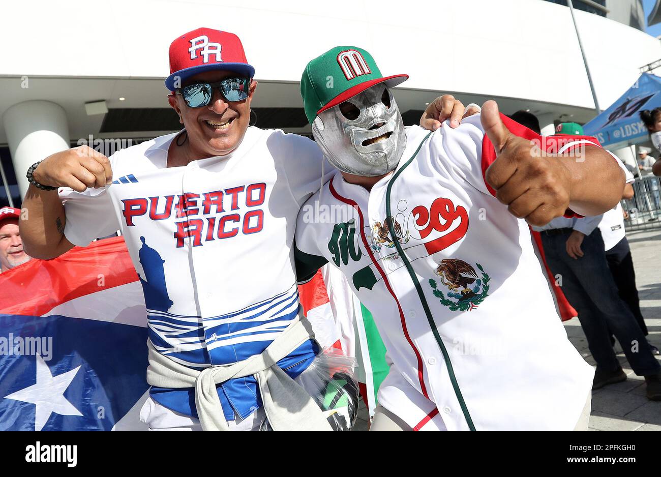 Miami, United States. 17th Mar, 2023. Baseball fans pose for a photo outside of LoanDepot Park prior to the start of the 2023 World Baseball Classic quarterfinal game between Mexico and Puerto Rico in Miami, Florida on Friday, March 17, 2023. Photo by Aaron Josefczyk/UPI Credit: UPI/Alamy Live News Stock Photo