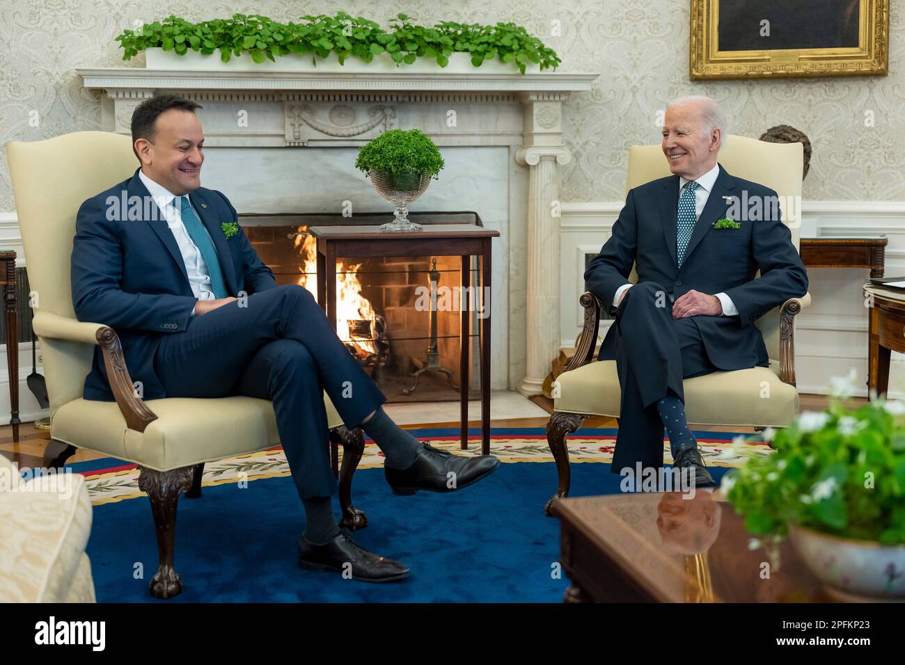 Washington, United States Of America. 17th Mar, 2023. Washington, United States of America. 17 March, 2023. U.S President Joe Biden, wearing a bunch of shamrocks in his breast pocket, chats with Irish Taoiseach Leo Varadkar, left, during the traditional St. Patrick's Day visit at the Oval Office of the White House, March 17, 2023 in Washington, DC Credit: Cameron Smith/White House Photo/Alamy Live News Stock Photo