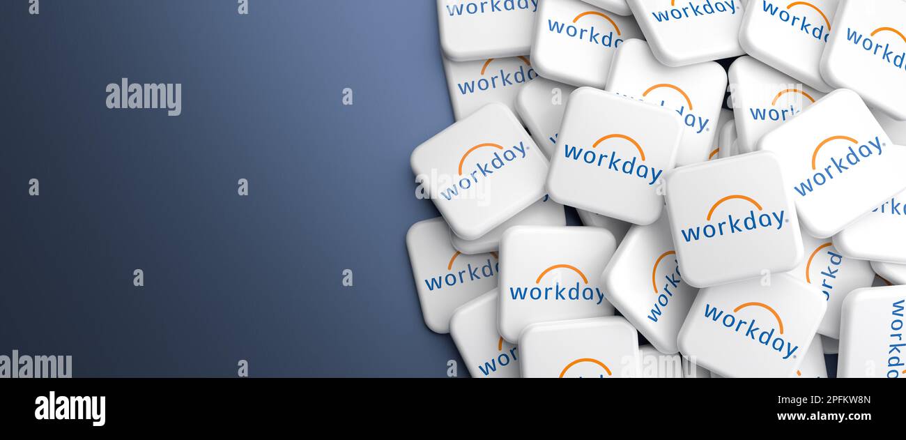 Logos of the cloud based financial and human capital management software vendor Workday on a heap on a table. Web banner format Stock Photo