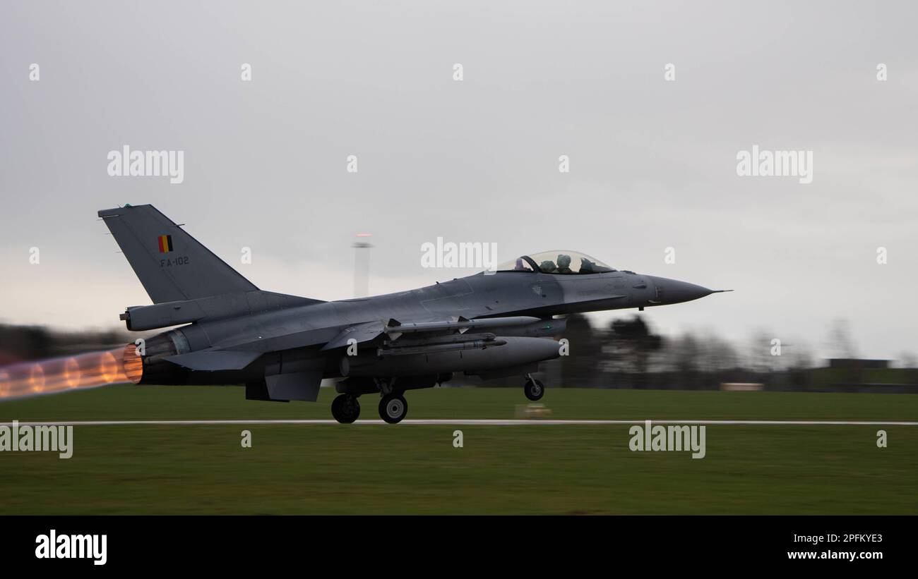 A Belgian Air Force F-16 Fighting Falcon takes-off at Royal Air Force Waddington, England, prior to a training mission for Exercise Cobra Warrior 23-1 March 14, 2023. Cobra Warrior provides valuable opportunities for all participating nations to develop tactical interoperability skills with partners, aircrew and supporting elements within a composite air operation environment. (U.S. Air Force photo by Airman 1st Class Austin Salazar) Stock Photo