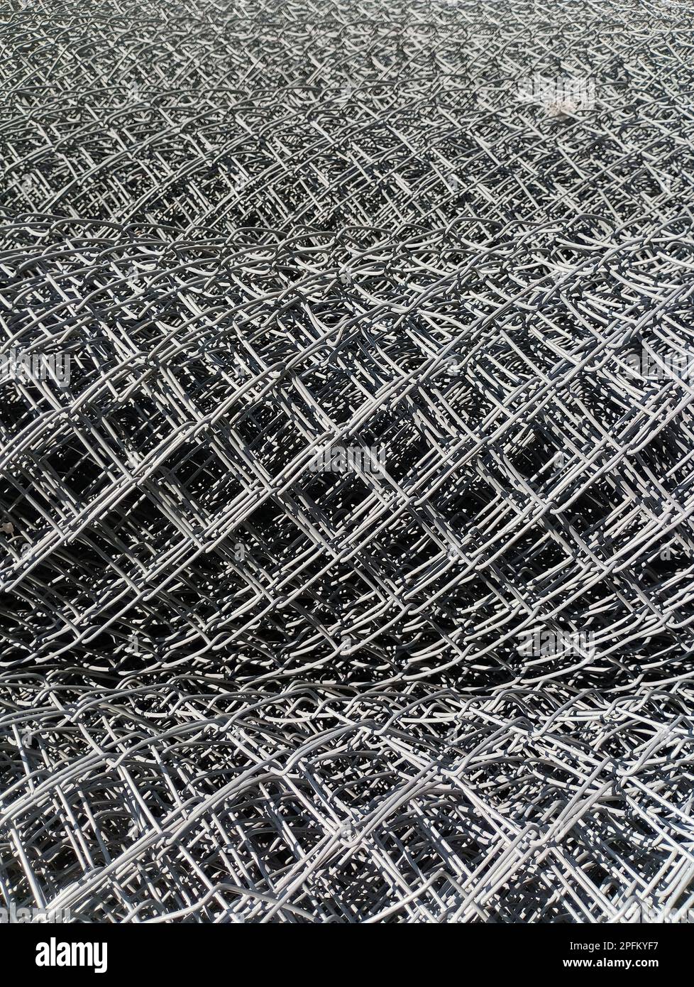 Metal wire in rolls close-up Stock Photo