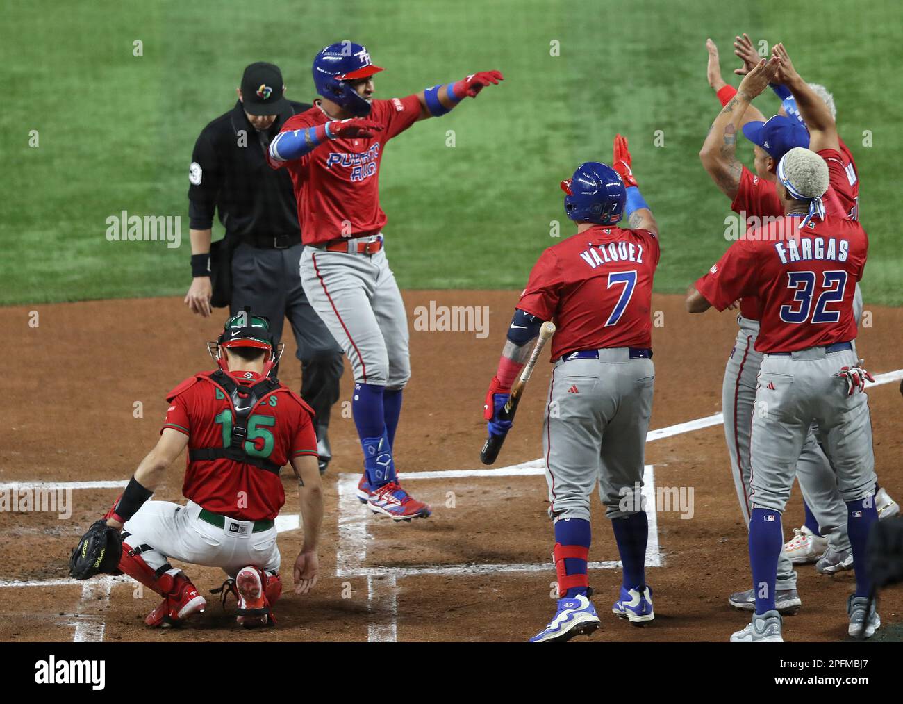 Miami, United States. 17th Mar, 2023. Puerto Rico's Eddie Rozario (17) celebrates his solo home run in the fist inning of the 2023 World Baseball Classic quarter-final game against Mexico in Miami, Florida on Friday, March 17, 2023. Photo by Aaron Josefczyk/UPI Credit: UPI/Alamy Live News Stock Photo