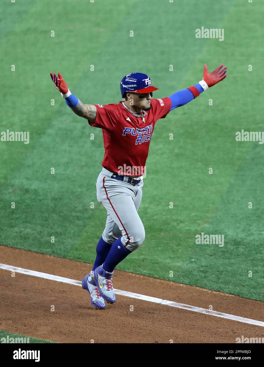Miami, United States. 17th Mar, 2023. Puerto Rico's Javier Baez (9) celebrates his two run home run in the second inning of the 2023 World Baseball Classic quarter-final game against Mexico in Miami, Florida on Friday, March 17, 2023. Photo by Aaron Josefczyk/UPI Credit: UPI/Alamy Live News Stock Photo
