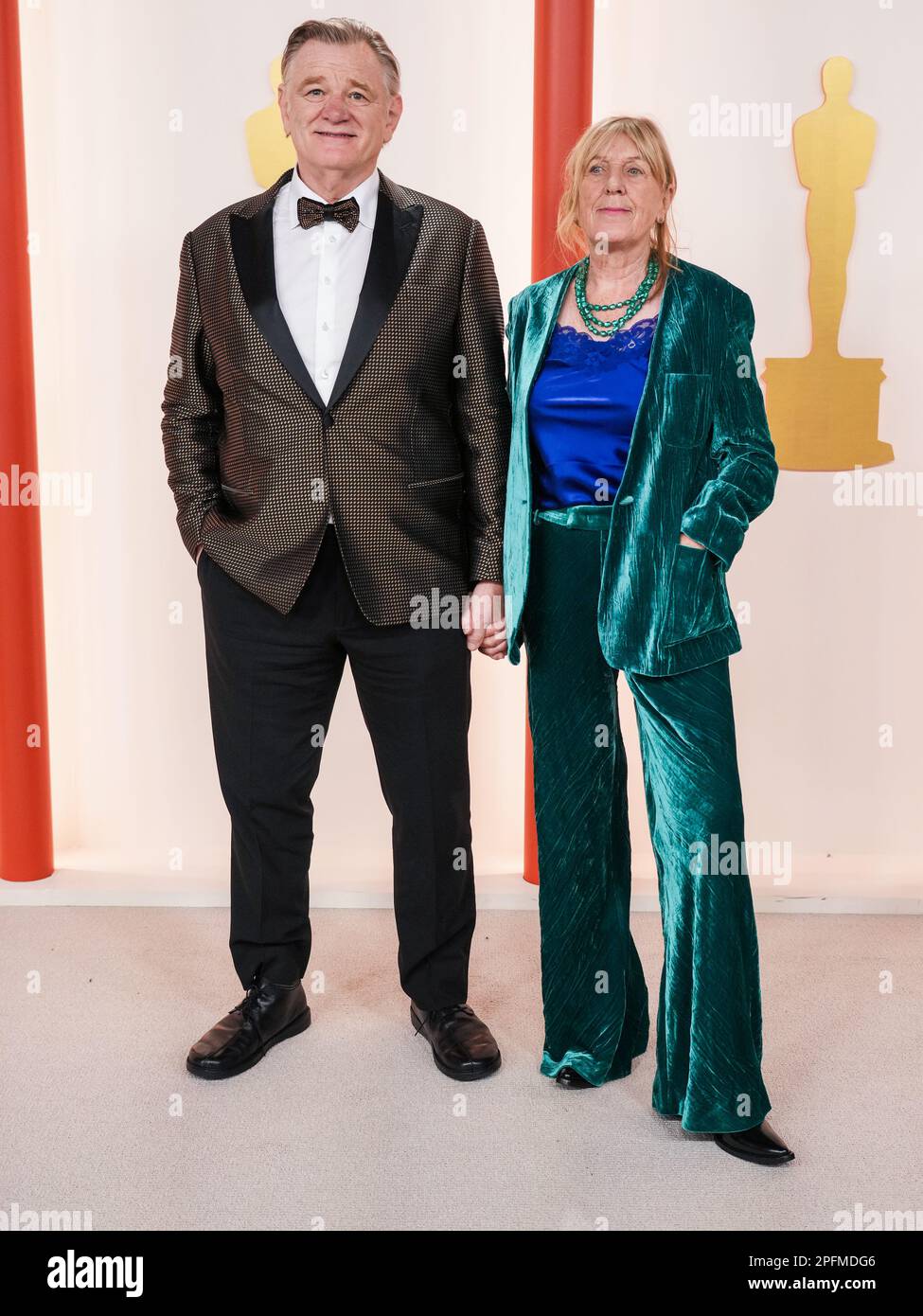 Los Angeles, USA. 12th Mar, 2023. Brendan Gleeson and Mary Gleeson walking on the red carpet at the The 95th Academy Awards held by the Academy of Motion Picture Arts and Sciences at the Dolby Theatre in Los Angeles, CA on March 12, 2023. (Photo by Sthanlee B. Mirador/Sipa USA) Credit: Sipa USA/Alamy Live News Stock Photo
