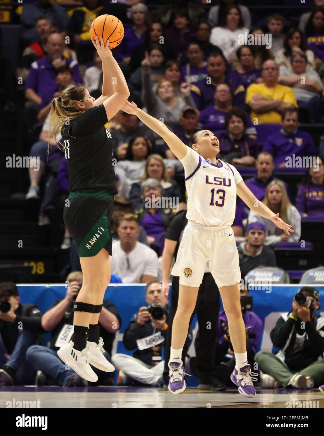 Baton Rouge, USA. 17th Mar, 2023. Hawai'i Rainbow Wahine forward Kallin Spiller (11) shoots a jumper over LSU Tigers guard Last-Tear Poa (13) during the first round of the Women's Basketball NCAA Tournament at the Pete Maravich Assembly Center in Baton Rouge, Louisiana on Friday, March 17, 2023. (Photo by Peter G. Forest/Sipa USA) Credit: Sipa USA/Alamy Live News Stock Photo