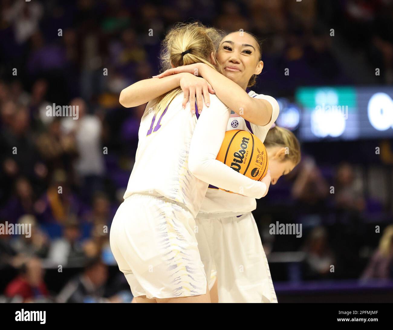 Baton Rouge, USA. 17th Mar, 2023. LSU Tigers forward Emily Ward (11) hugs LSU Tigers guard Last-Tear Poa (13) at the end of their first round game against Hawai'i Rainbow Wahine in the Women's Basketball NCAA Tournament at the Pete Maravich Assembly Center in Baton Rouge, Louisiana on Friday, March 17, 2023. (Photo by Peter G. Forest/Sipa USA) Credit: Sipa USA/Alamy Live News Stock Photo