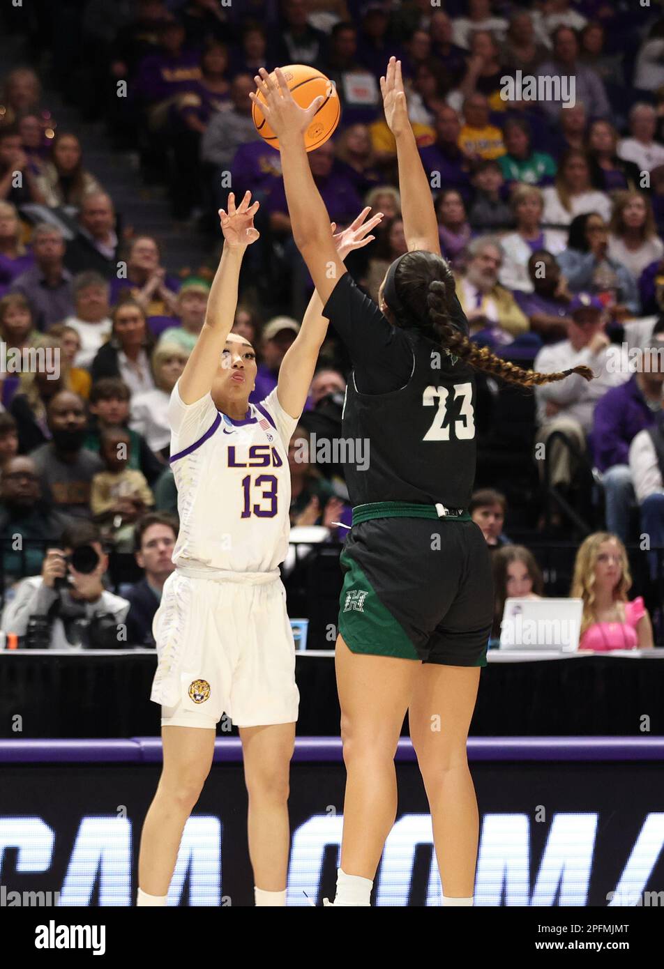 Baton Rouge, USA. 17th Mar, 2023. LSU Tigers guard Last-Tear Poa (13) shoots a three-pointer over Hawai'i Rainbow Wahine guard Meilani McBee (23) during the first round of the Women's Basketball NCAA Tournament at the Pete Maravich Assembly Center in Baton Rouge, Louisiana on Friday, March 17, 2023. (Photo by Peter G. Forest/Sipa USA) Credit: Sipa USA/Alamy Live News Stock Photo