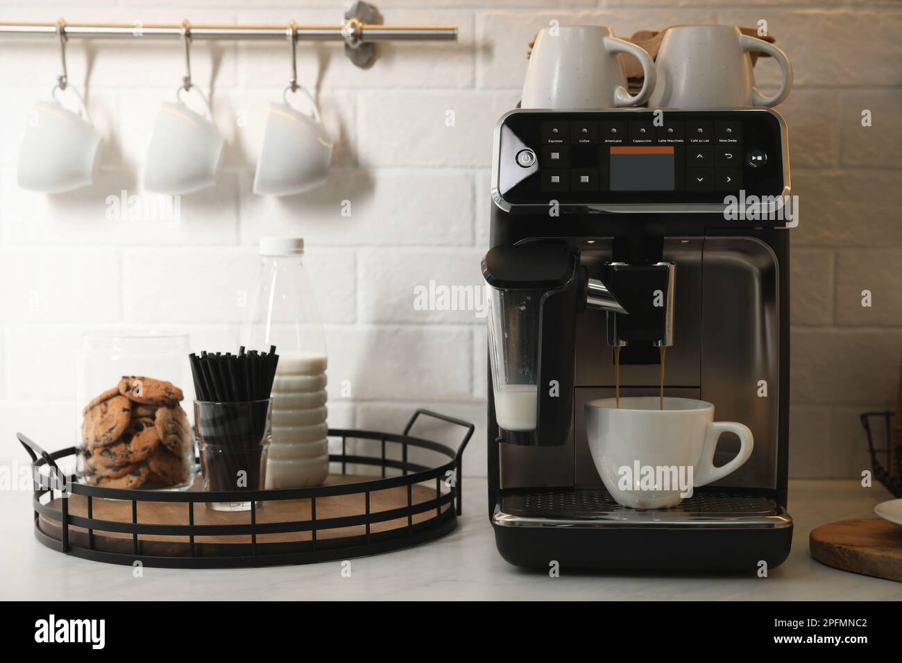 Modern coffee machine on countertop in office kitchen Stock Photo Alamy