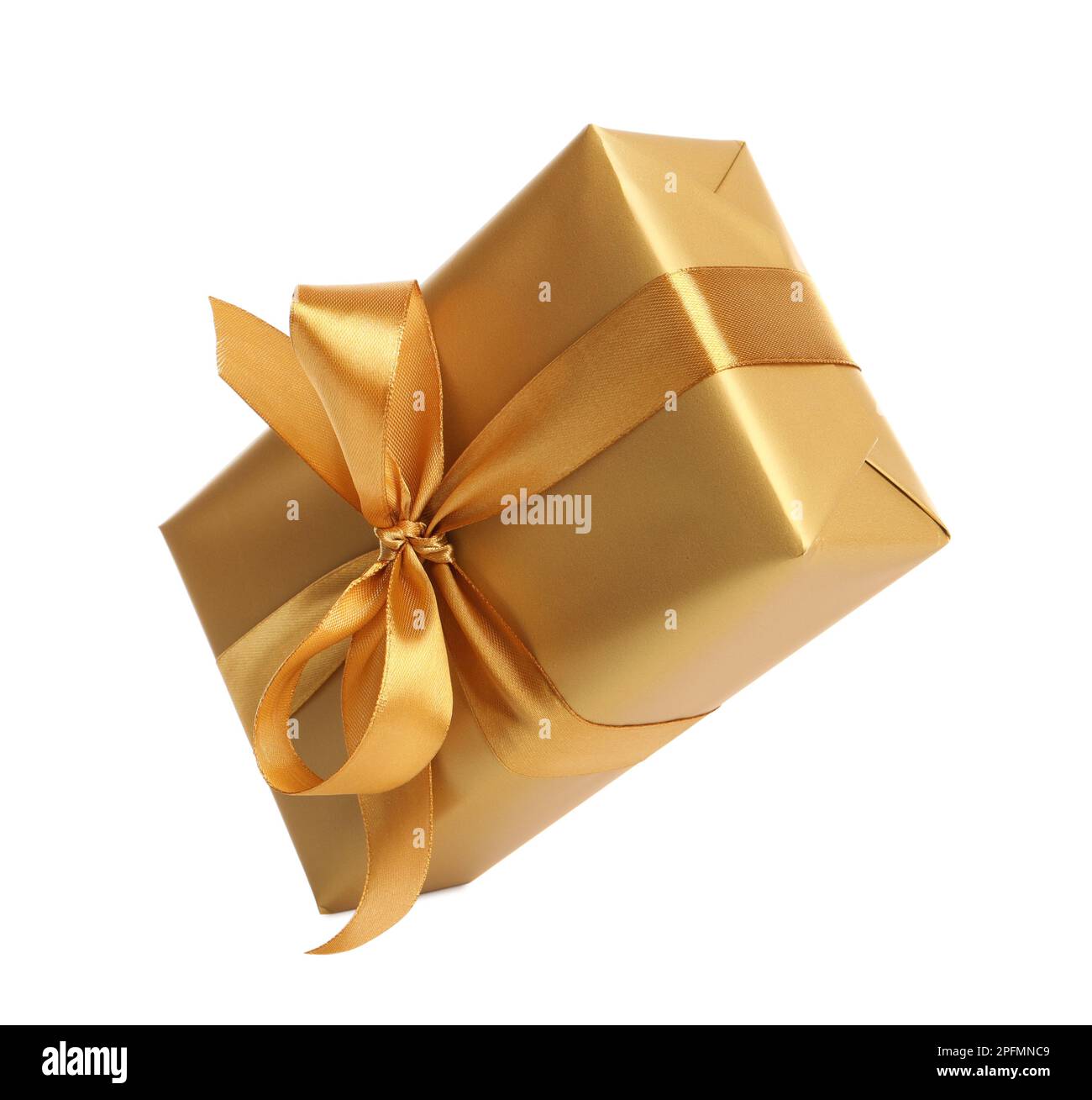 Gift box with golden ribbon and bow on white background Stock Photo - Alamy