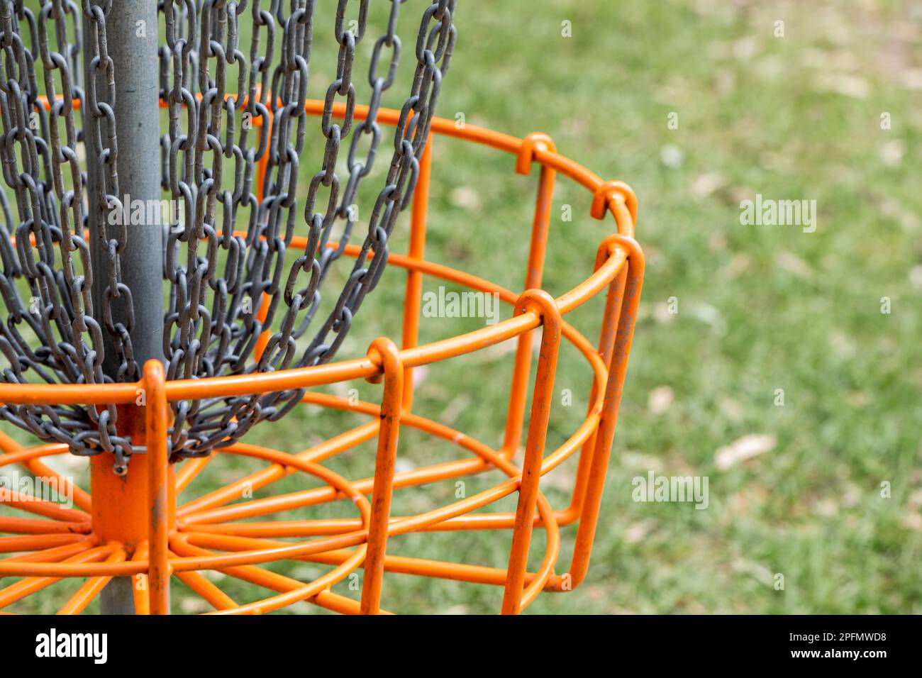 Closeup of metal disc golf basket with a shallow depth of field Stock Photo