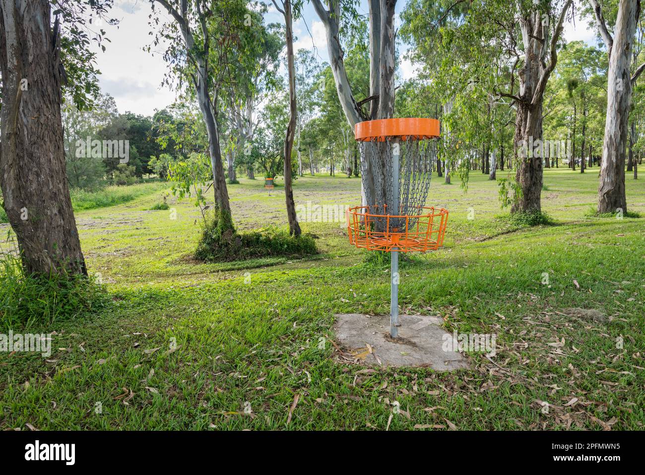 Disc golf (frolf) basket in a park obstacle course Stock Photo
