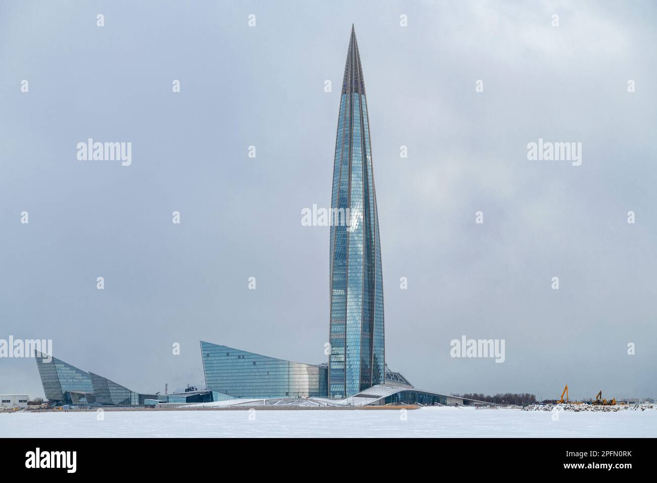 SAINT PETERSBURG, RUSSIA - MARCH 13, 2023: View of the Lakhta Center high-rise building from the Gulf of Finland on a cloudy March day Stock Photo