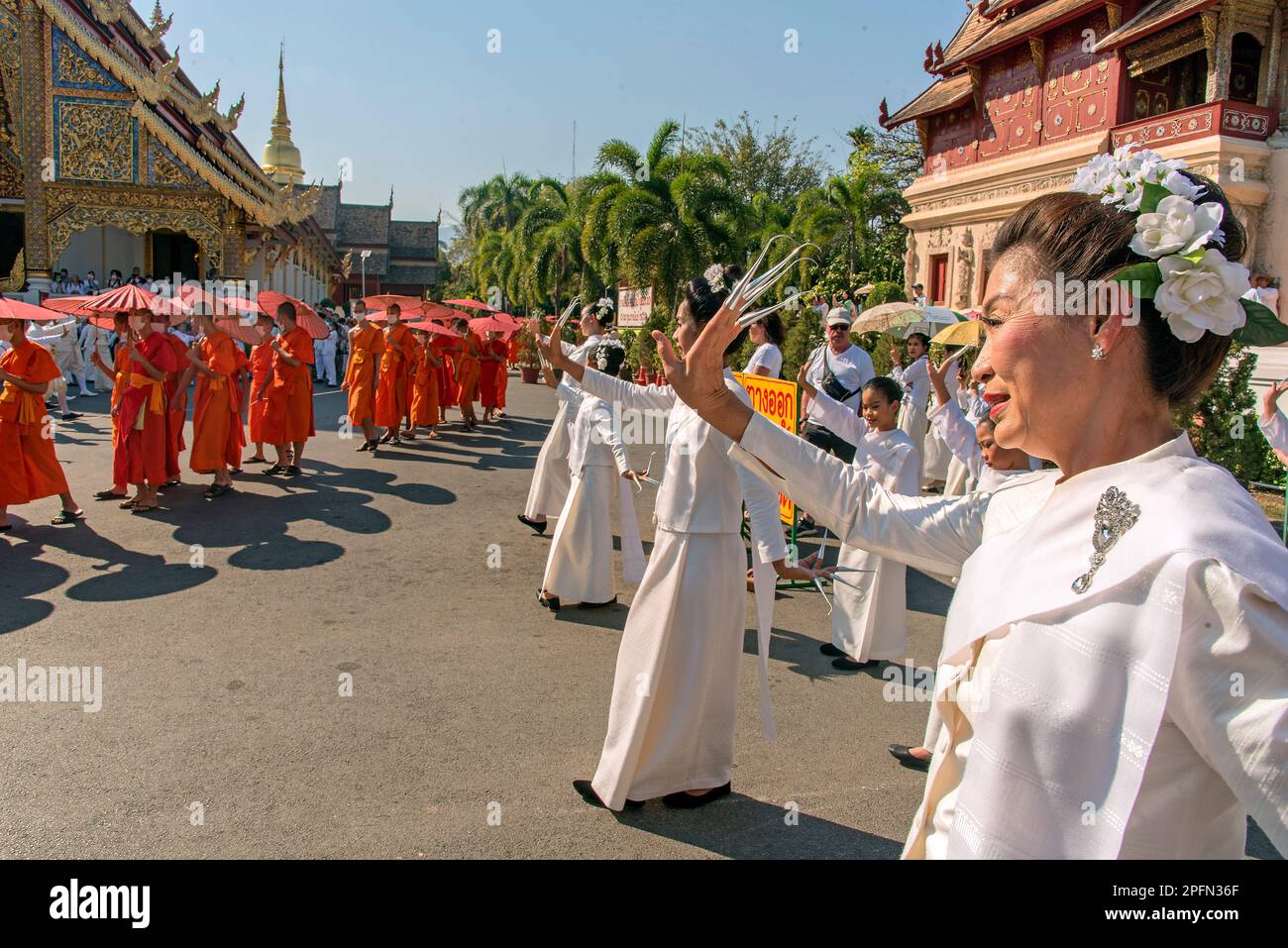 Monks and Fon lep  fingernail dancers, funeral procession from Wat Phra Singh, Chiang Mai Thailand Stock Photo