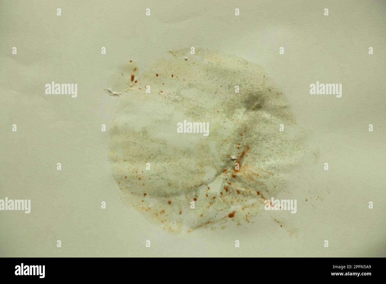 dirty greasy stain after eating on an isolated background, food stains on the table Stock Photo