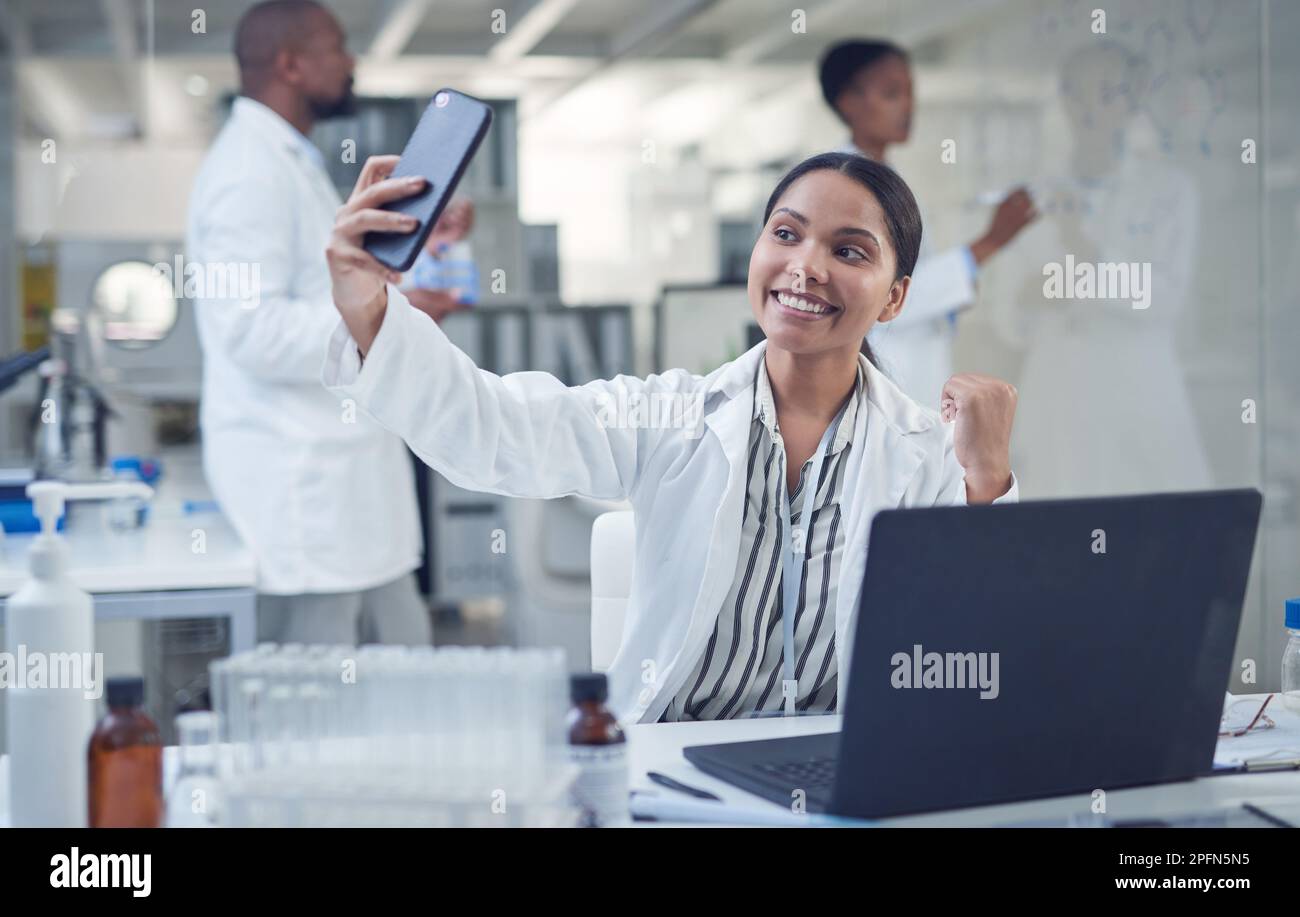 Happy smart scientist sitting hi-res stock photography and images - Alamy