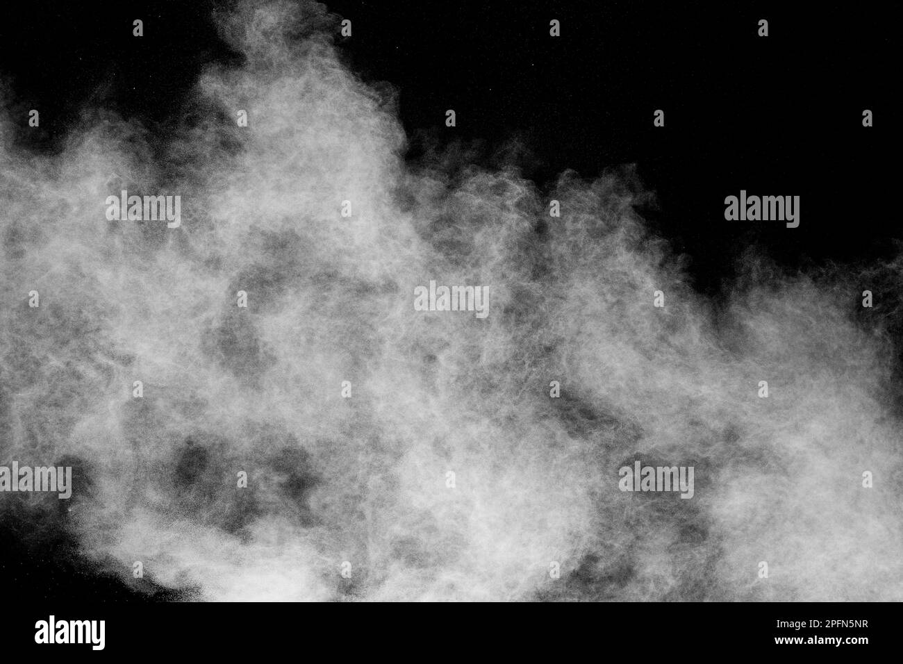 White dust cloud in the air.Abstract white powder explosion against