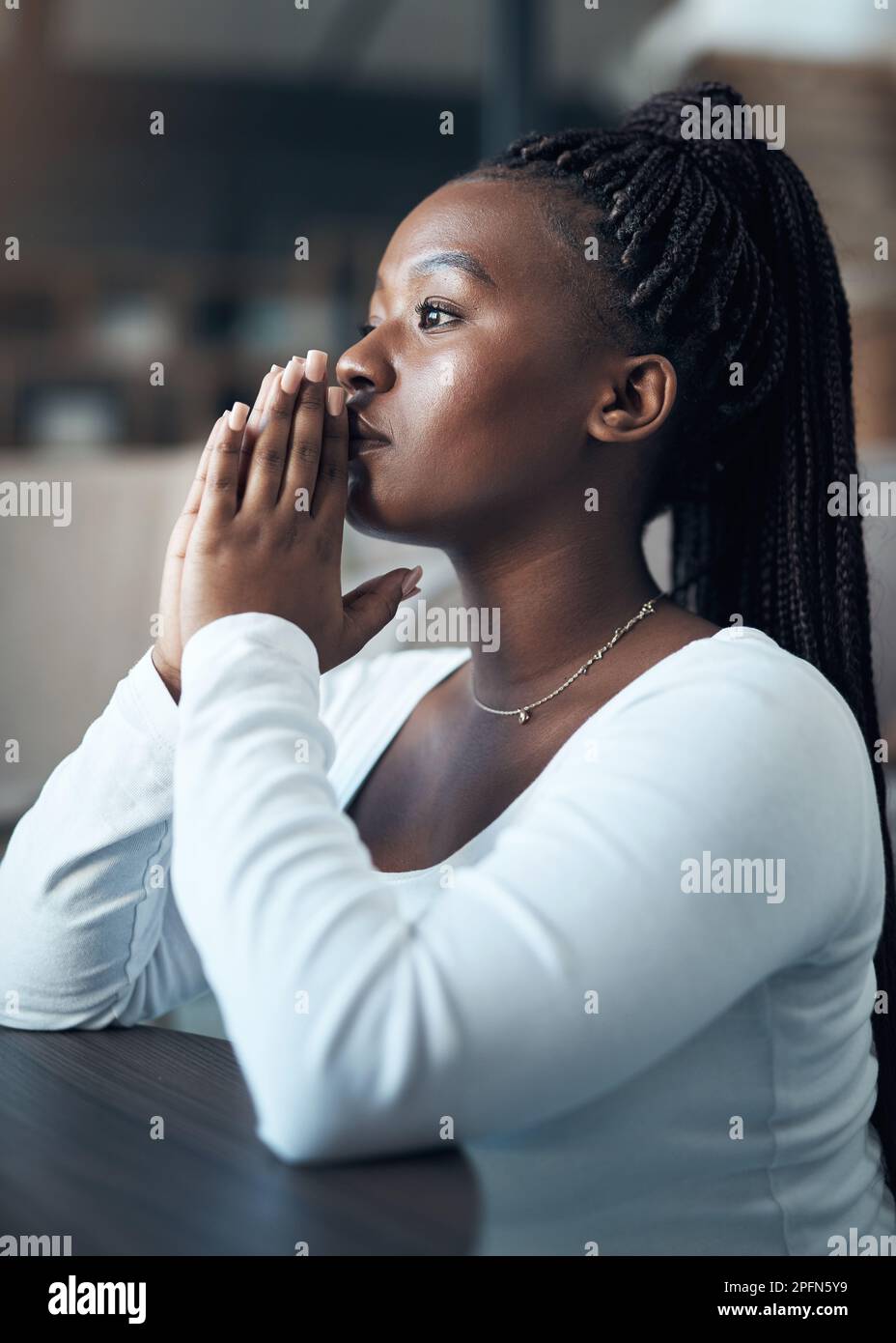There is power in prayer an attractive young woman kneeling alone and