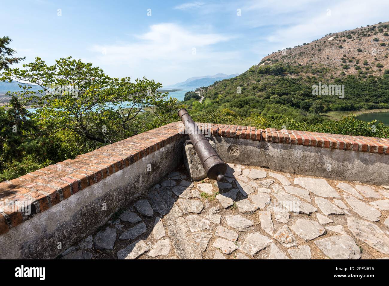 Old cannon at Butrint fortress in the Butrint National Park, Albania, a ...