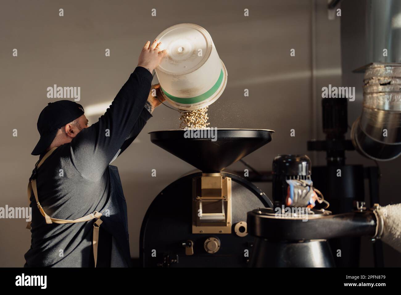 Loading raw coffee beans hi-res stock photography and images - Alamy