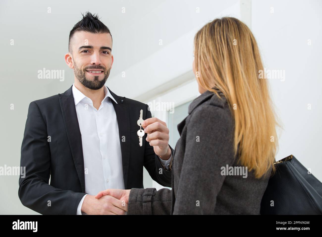 smiling woman meeting with realtor Stock Photo