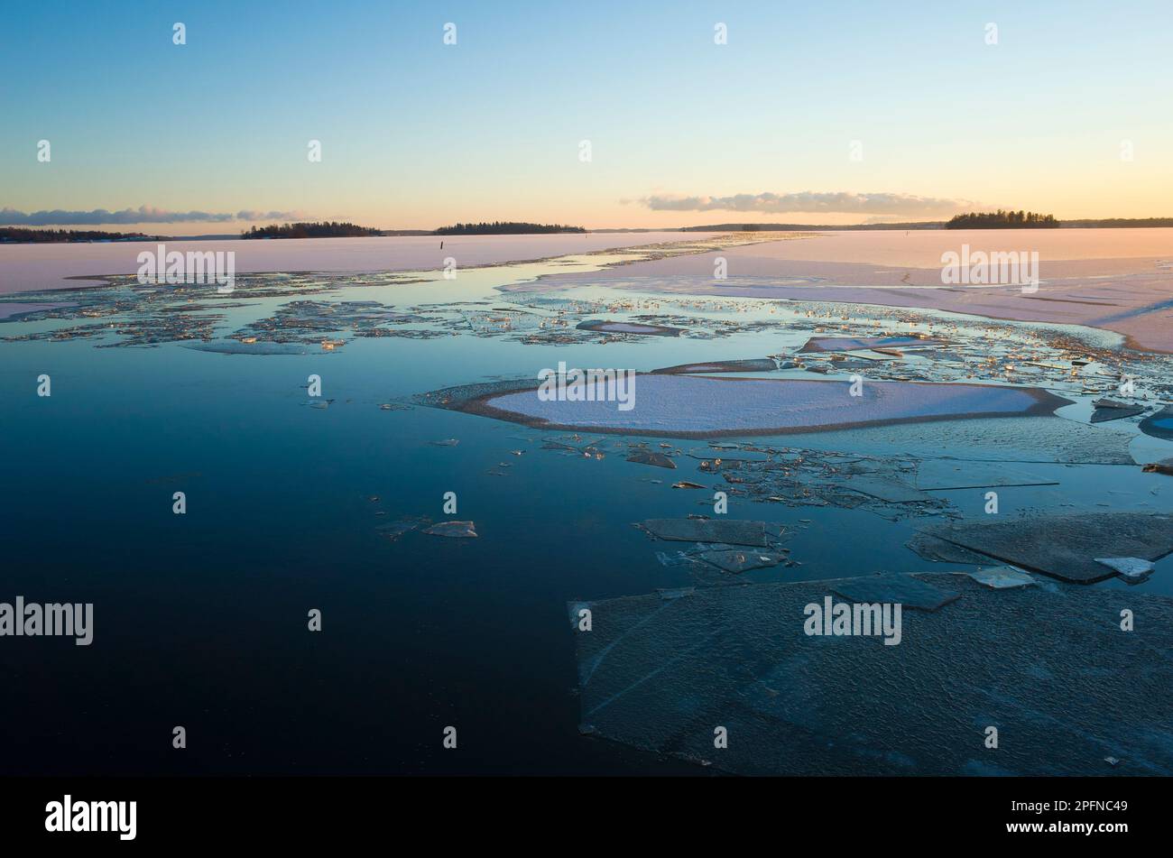 Vaesteros Winter short day in Scandinavia, Floating ice on lake Malaren, Vasteras ...