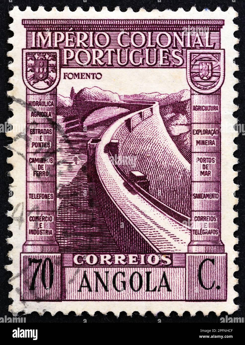ANGOLA - CIRCA 1938: A stamp printed in Angola shows Barrage, circa 1938. Stock Photo