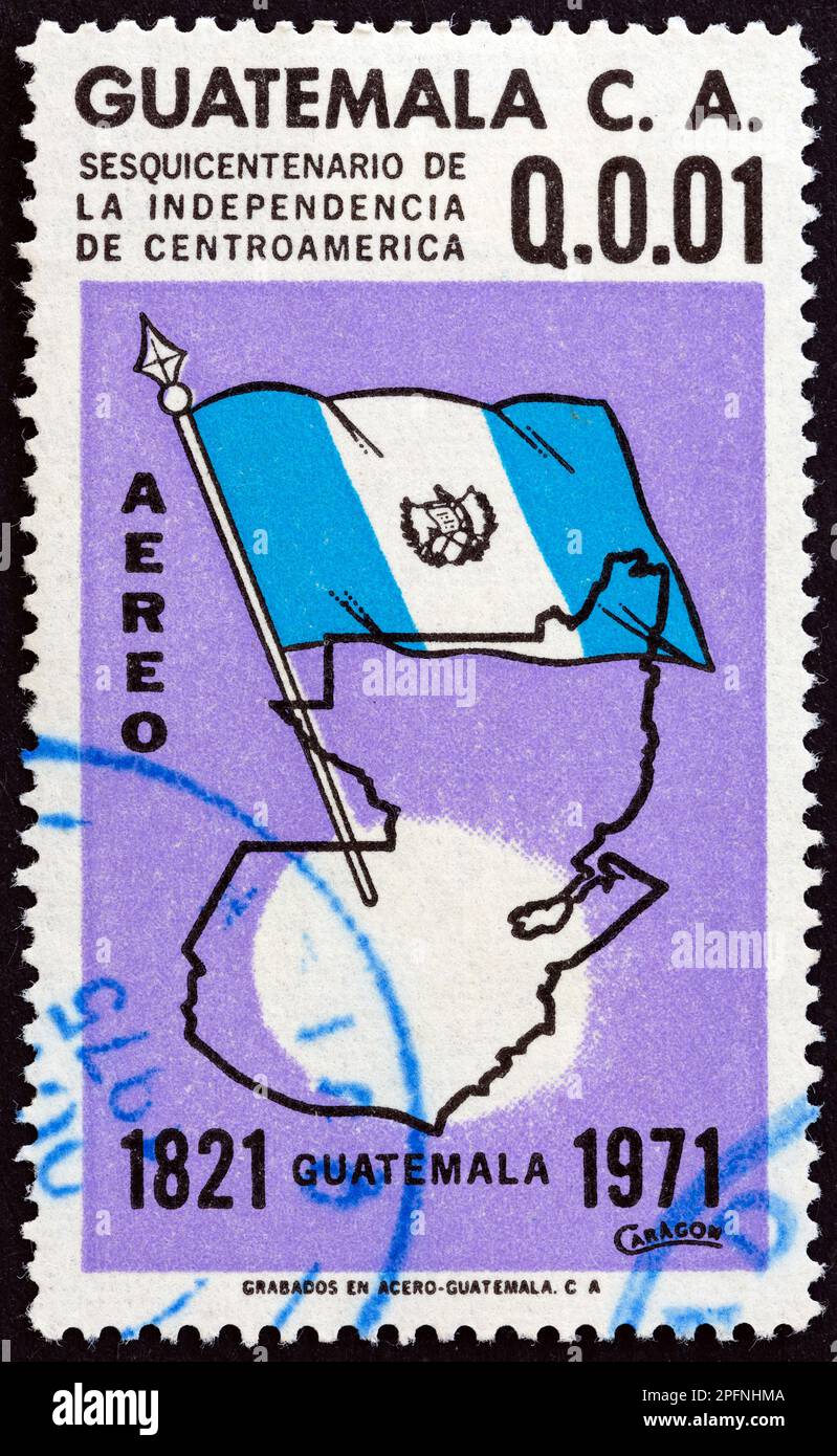 GUATEMALA - CIRCA 1971: A stamp printed in Guatemala issued for the 150th anniversary of Central American Independence shows flag and map, circa 1971. Stock Photo