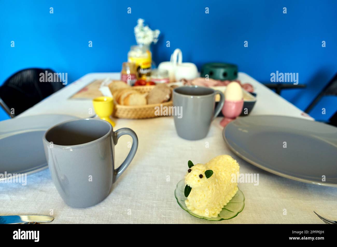 set table with Easter butter lamb prepared for Easter breakfast in Poland Stock Photo
