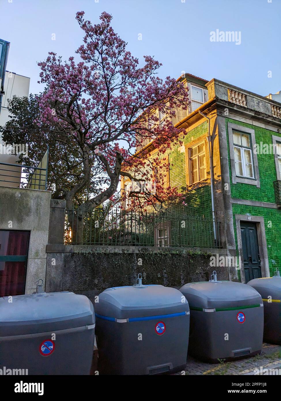 Containers of garbage on the street of Porto, Portugal Stock Photo Alamy