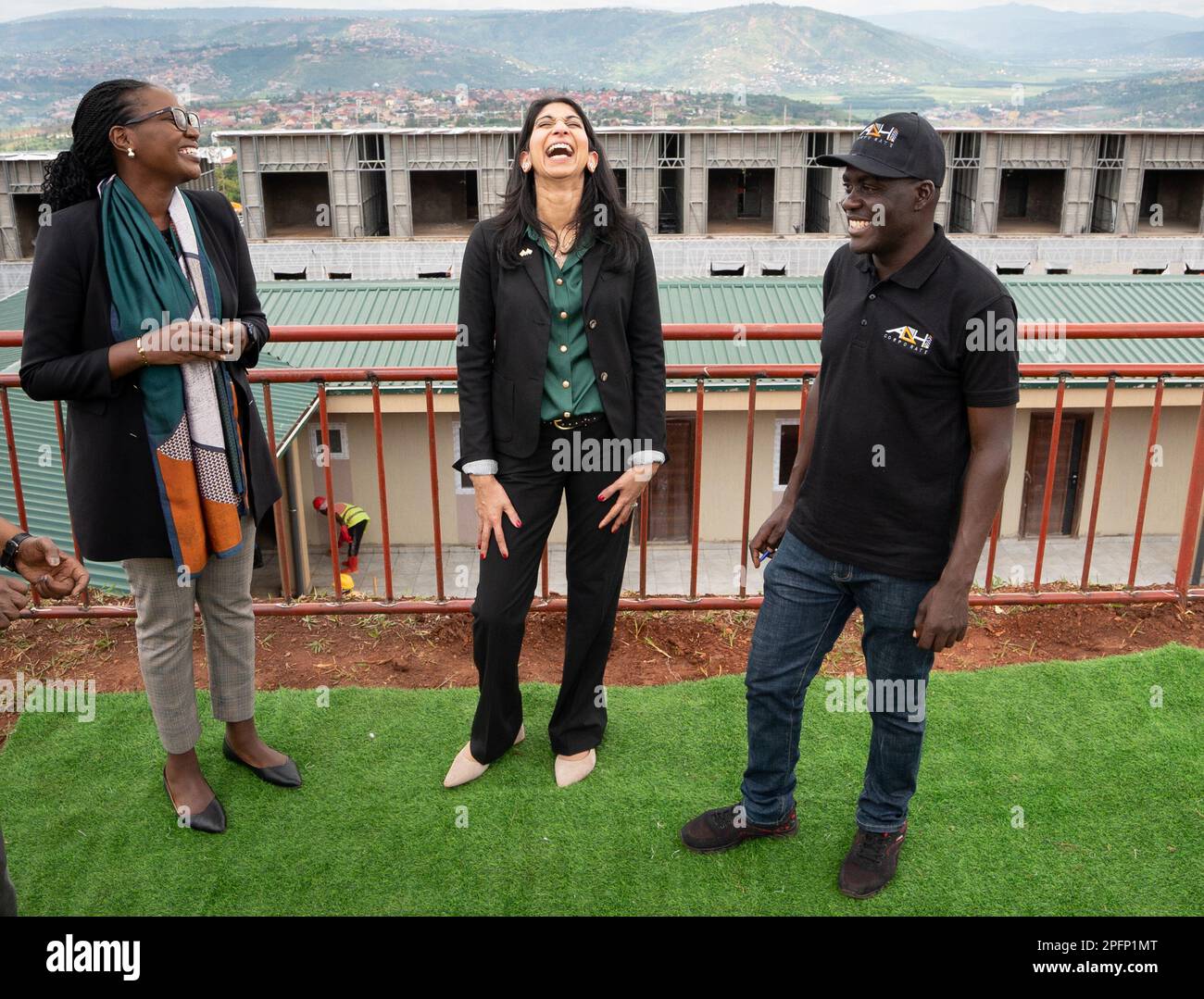 Home Secretary Suella Braverman tours a building site on the outskirts of Kigali during her visit to Rwanda, to see houses that are being constructed that could eventually house deported migrants from the UK. Picture date: Saturday March 18, 2023. Stock Photo