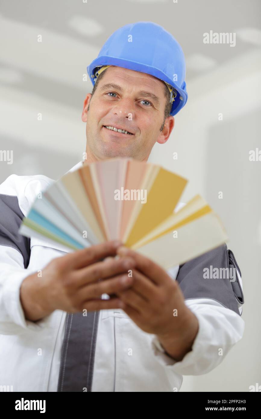 Handiman Color handyman showing fanned color swatches over white background Stock ...