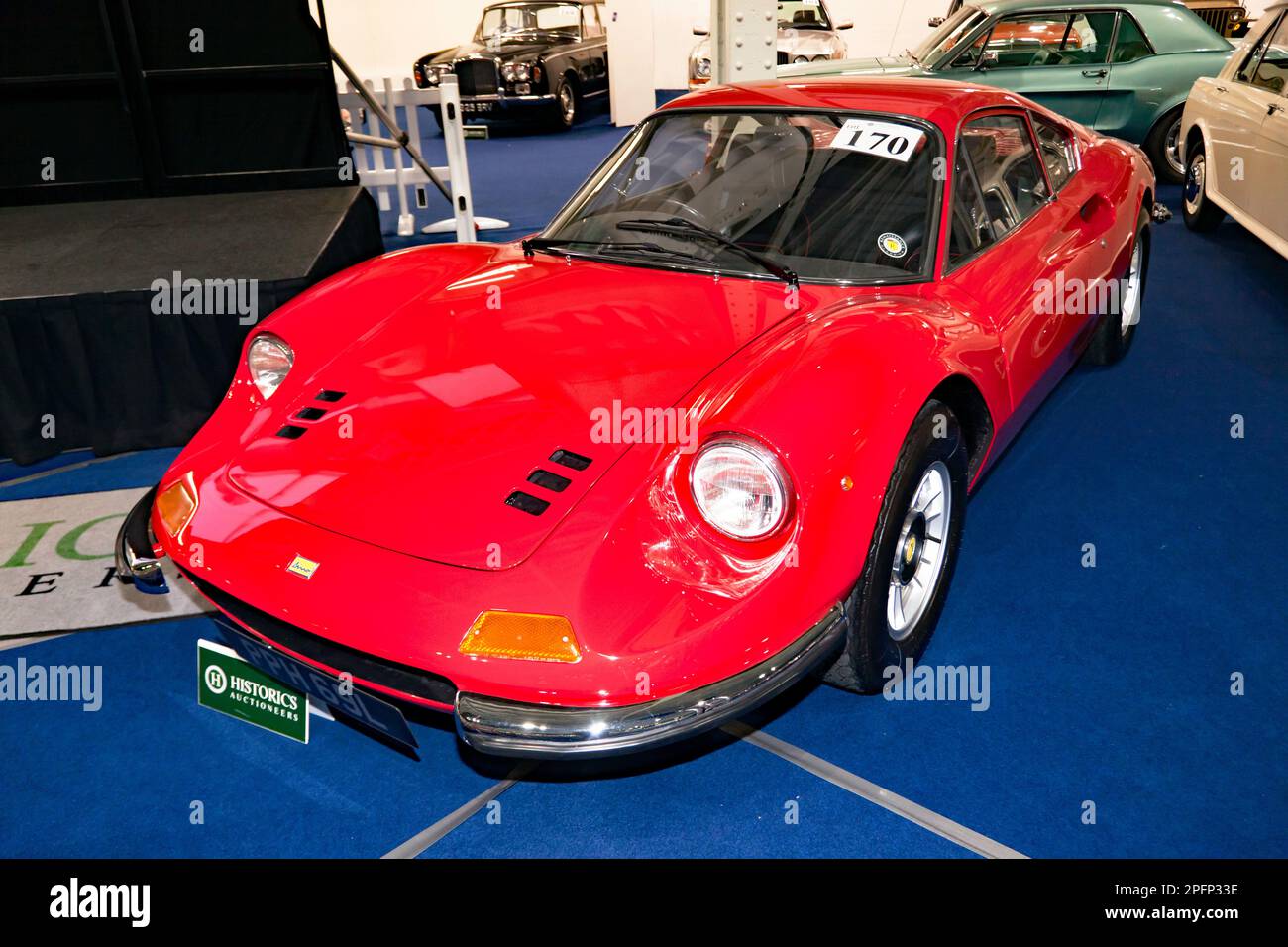 Three-quarters Front View of a Red, 1973, Ferrari Dino 246 GT, part of the 2023 London Classic Car Auction at Olympia, London Stock Photo