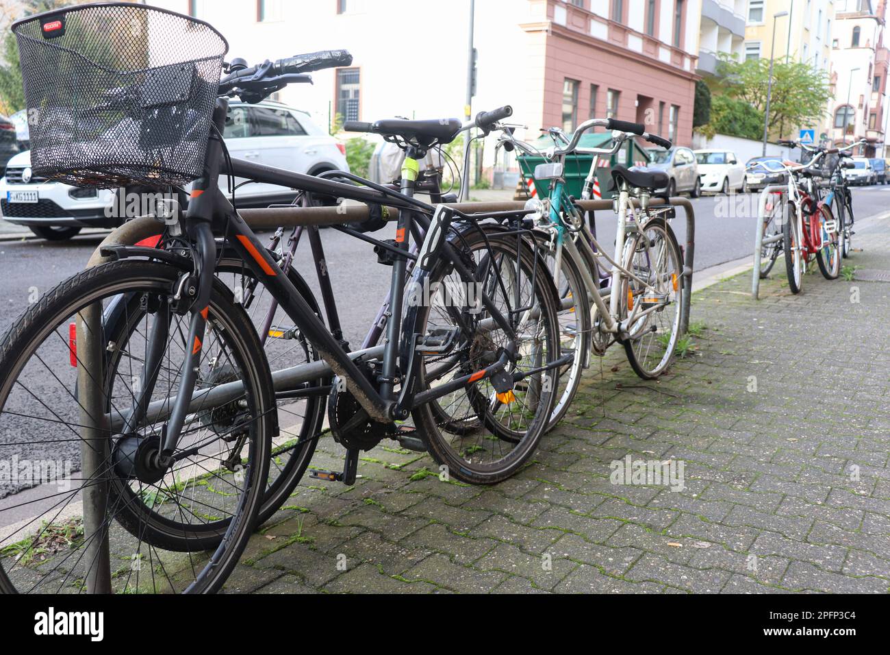 Bicycle are Parked and Locked Safely in the Side of The Street in Frankfurt, Germany Stock Photo