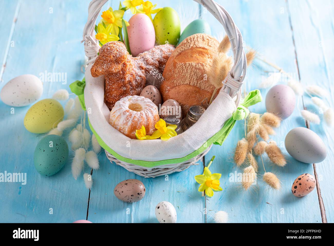 Traditional Easter basket as Traditions on Holy Sunday in Easter. Cake
