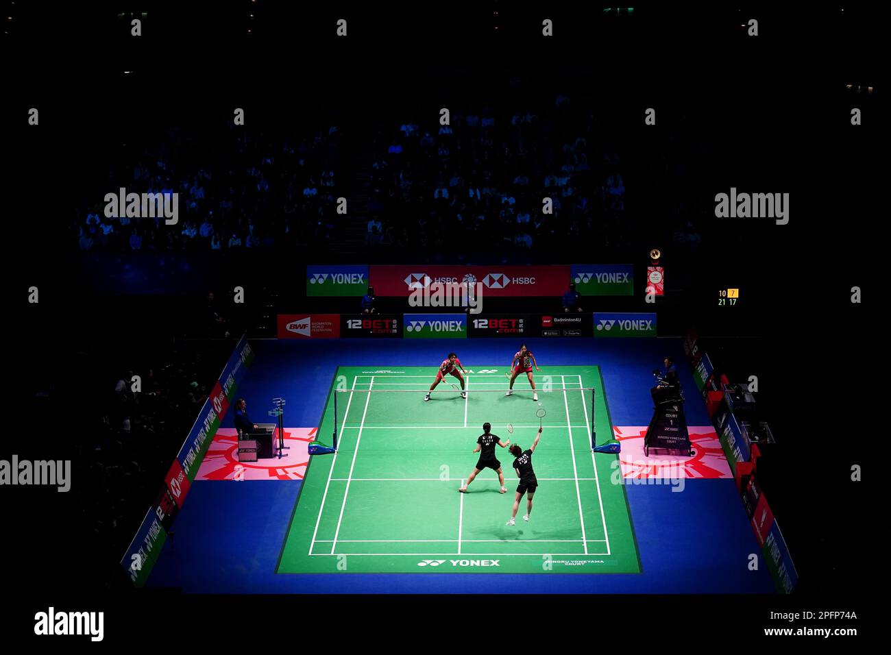 India's Treesa Jolly (top left) and Gayatri Gopichand Pullela (top right) in action against Korea's Baek Ha Na (bottom left) and Lee So Hee during day four of the YONEX All England Open Badminton Championships at the Utilita Arena Birmingham. Picture date: Friday March 17, 2023. Stock Photo