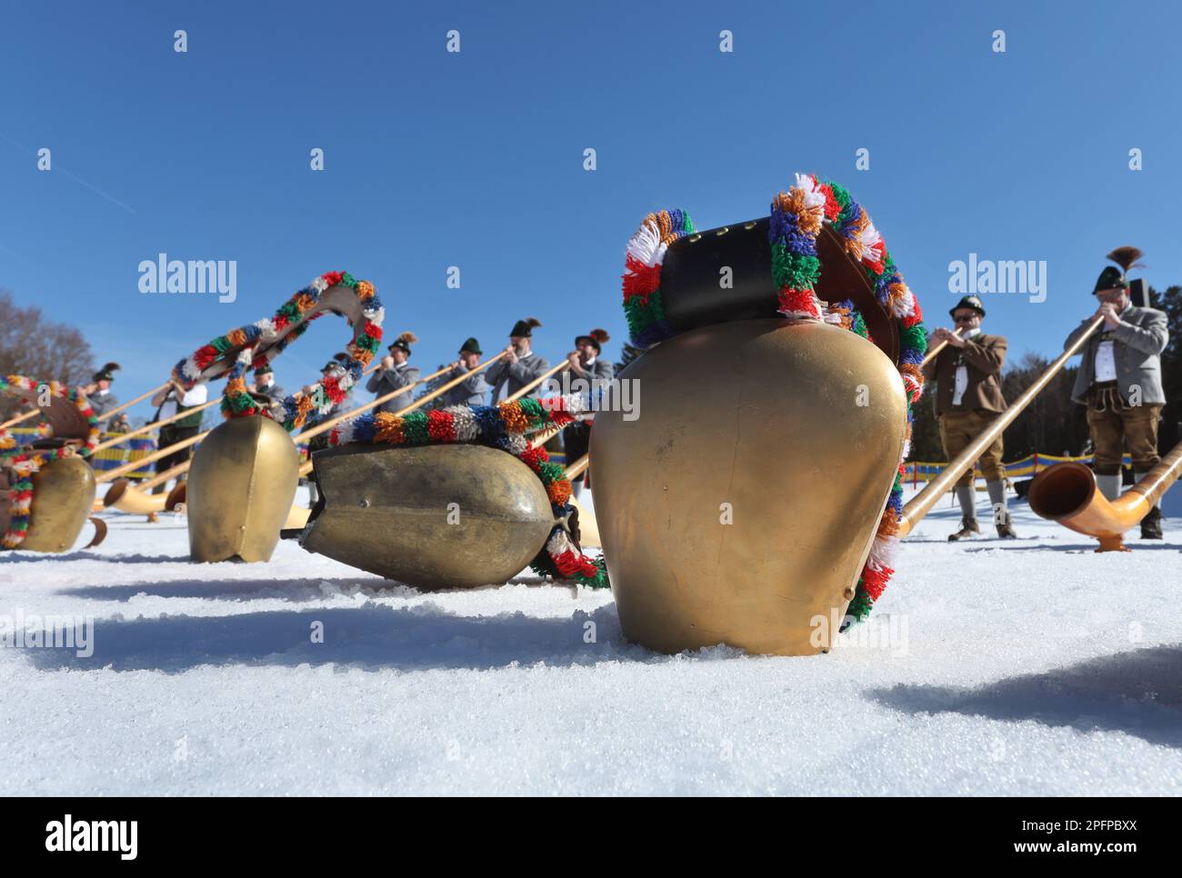 Bad Hindelang, Germany. 18th Mar, 2023. Alphorn players stand behind