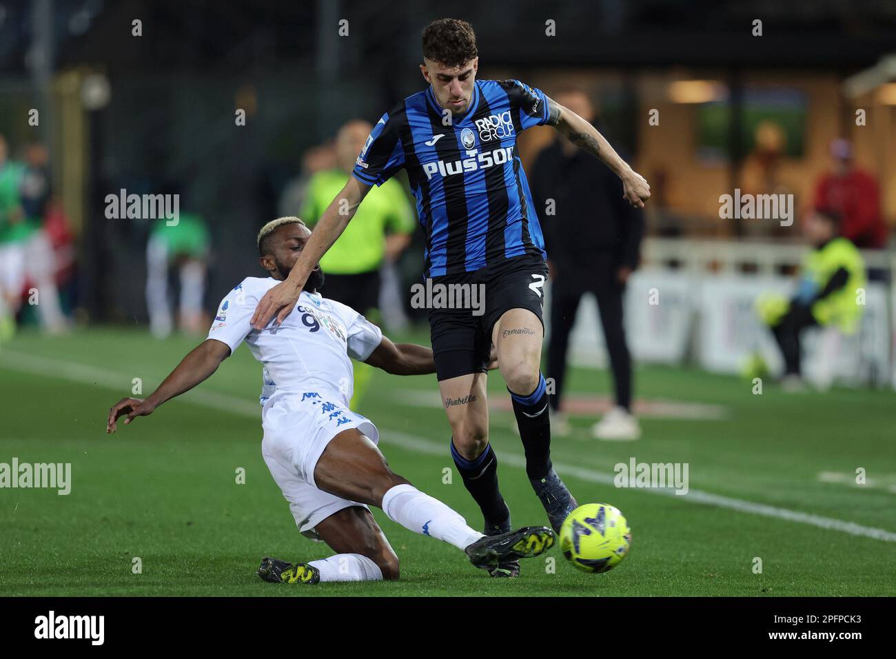 Gewiss Stadium, Bergamo, Italy, March 17, 2023, Matteo Ruggeri of Atalanta BC is challenged by