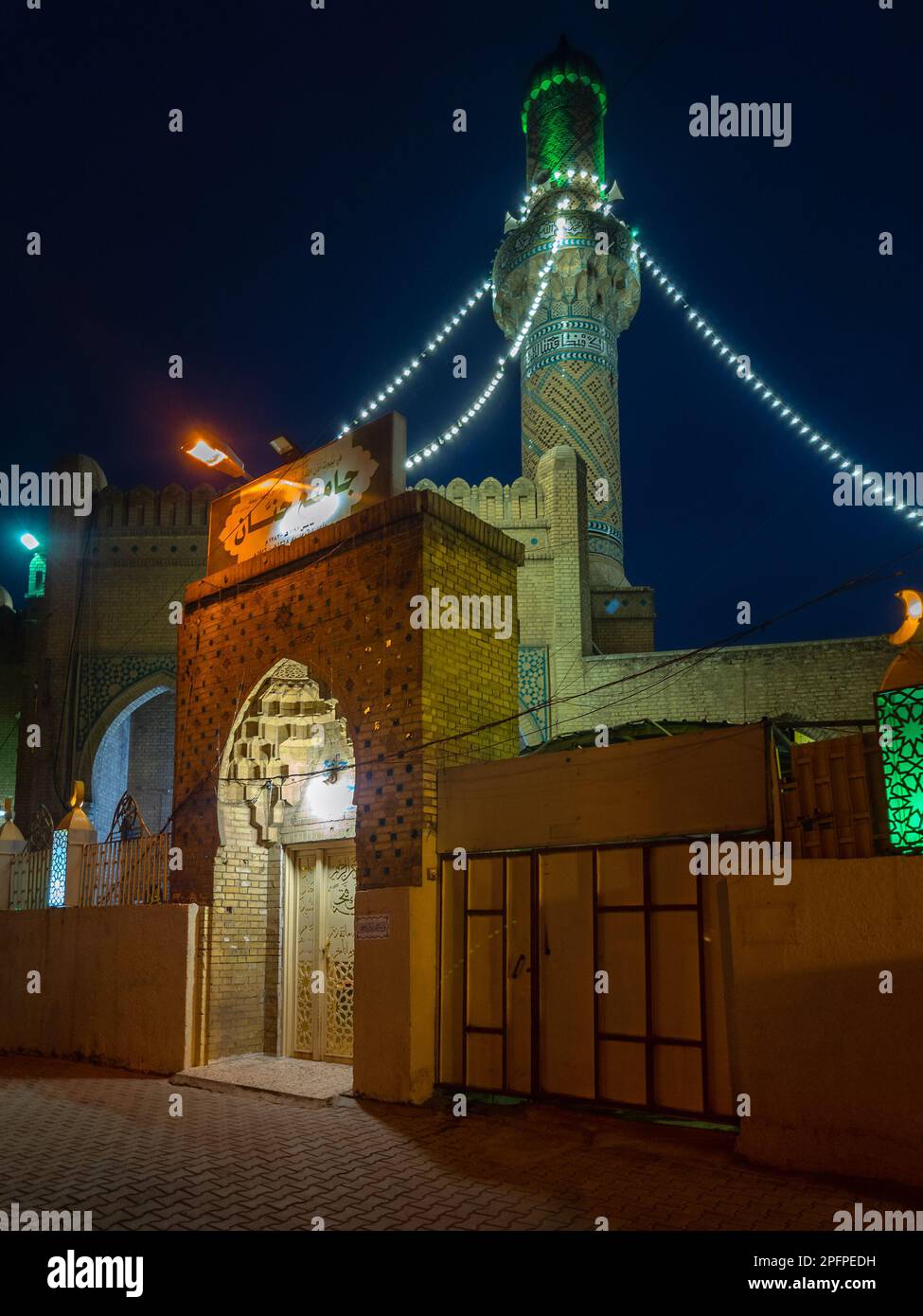 Baghdad, Iraq - Mar 3, 2023: Portrait Night View of Hannan Mosque, it was Built at the Time Ottoman Empire in 1782. Stock Photo