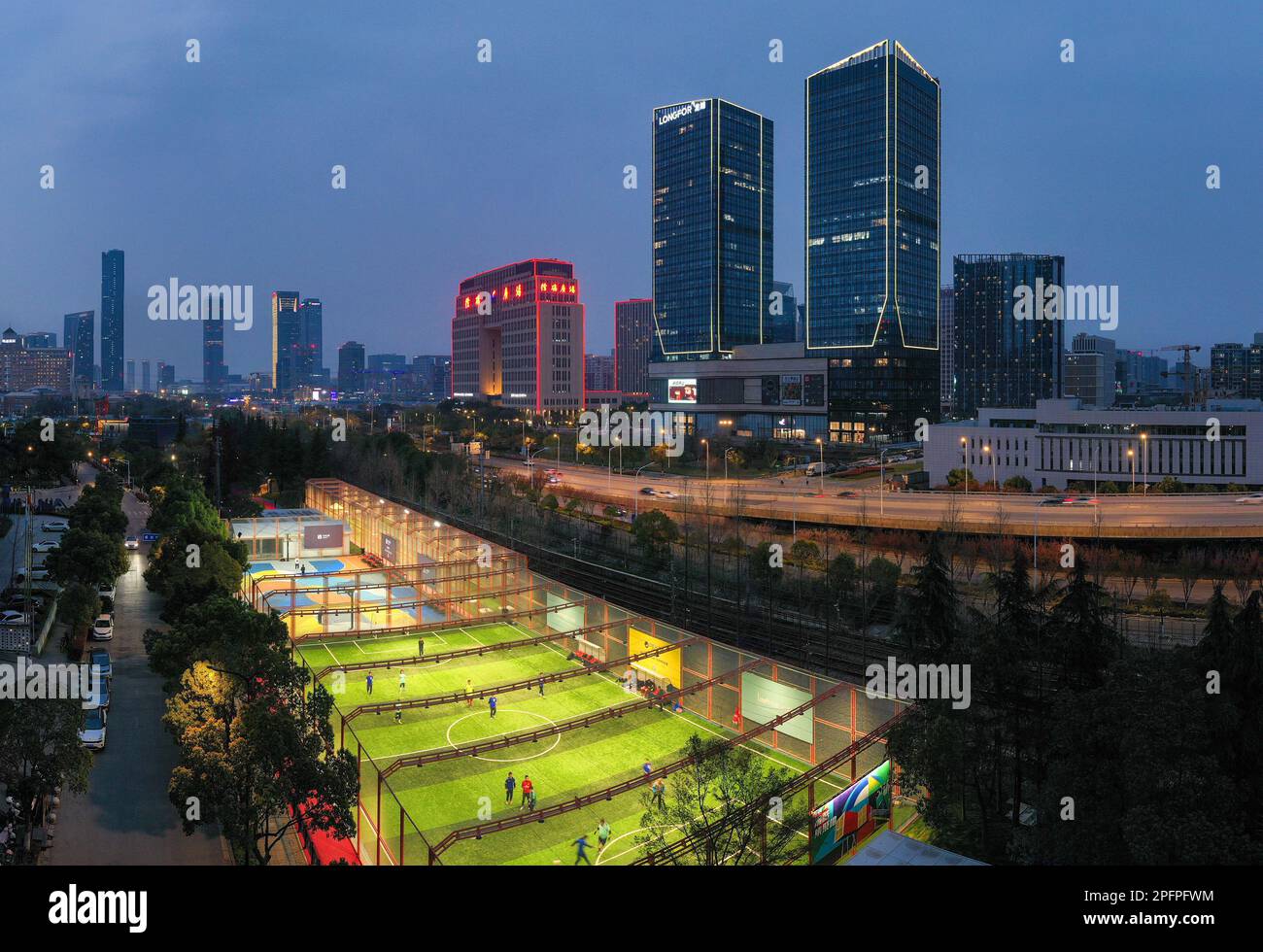 NANJING, CHINA - MARCH 18, 2023 - People play on a trial court at the 24-hour City Sports Block in Nanjing, East China's Jiangsu province, March 18, 2 Stock Photo