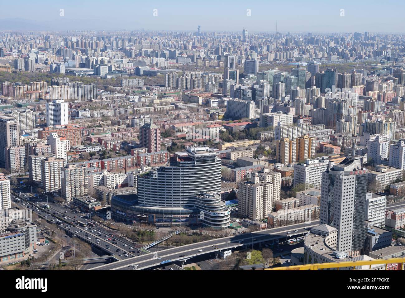 BEIJING, CHINA - MARCH 18, 2023 - The cItyscape of Beijing is seen from the 238-meter viewing platform of the China Central Television Tower in Beijin Stock Photo