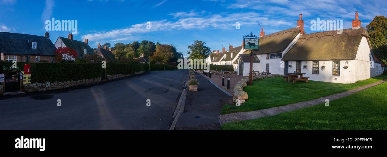 The village of Etal with its white painted Black Bull pub the only
