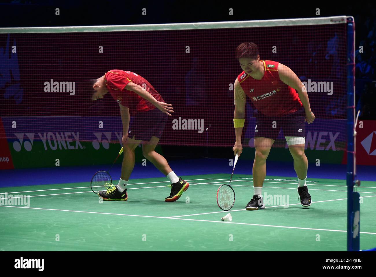 China's Liang Wei Keng and Wang Chang react during their men's double ...